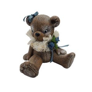 vintage 1970s ceramic bear with lace collar with flowers and a hairbow figurine.